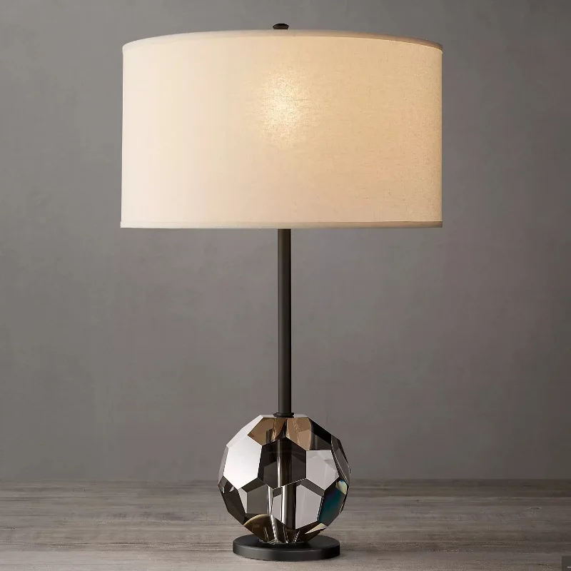 Modern simple football crystal all-copper table lamp, creative bedroom bedside table lamp
Modern simple football crystal all-copper table lamp, creative bedroom bedside table lamp