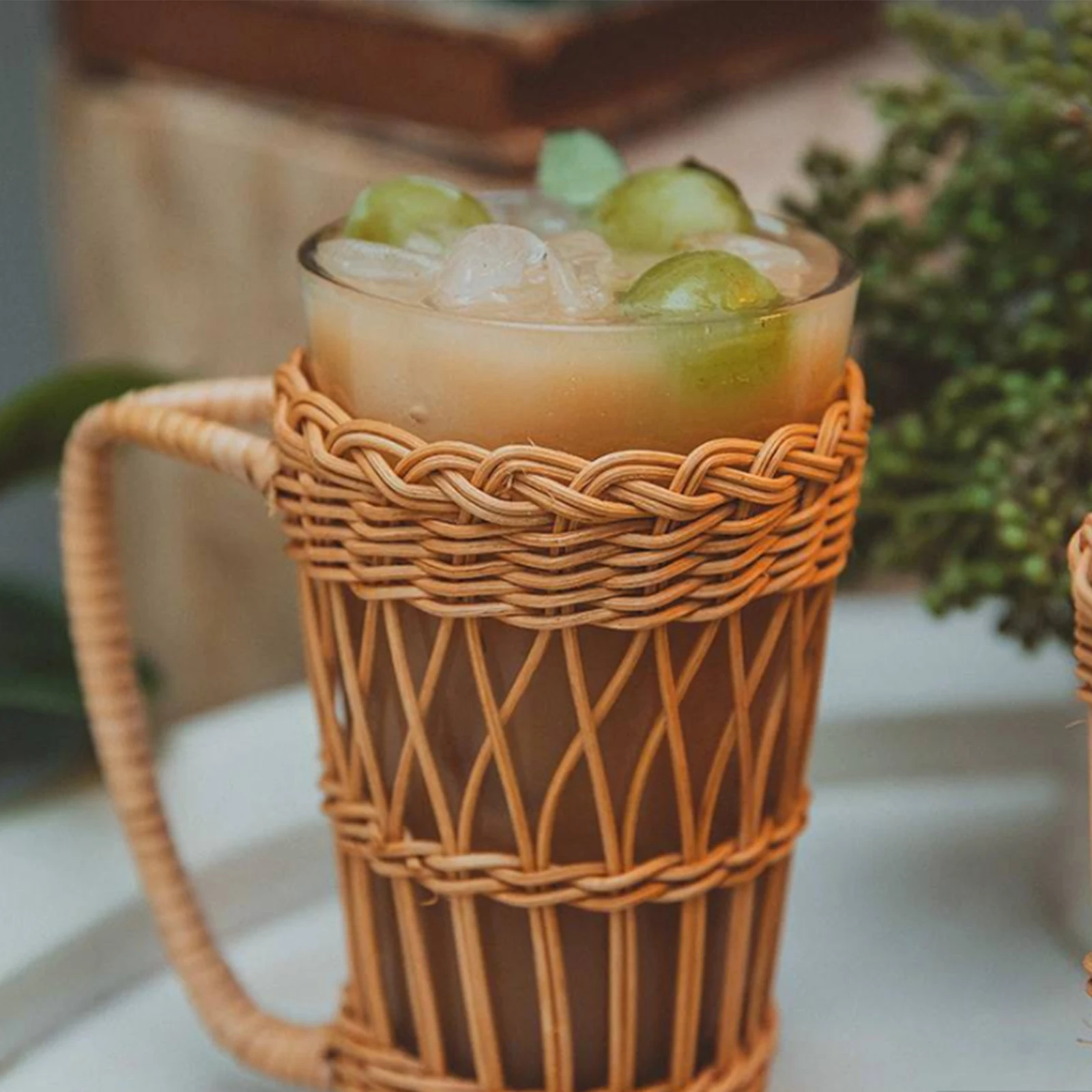 Glass Cup with Hand Woven Rattan Sleeve Heat Resistant Premium Glass Water Cup for Home Bar Party Restaurant Use
Glass Cup with Hand Woven Rattan Sleeve Heat Resistant Premium Glass Water Cup for Home Bar Party Restaurant Use