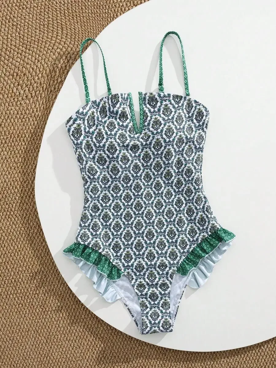 Womens One-Piece Swimsuit With Deep V-Neck And Ruffled Hem, Geometric Print Summer Beach Wear
Womens One-Piece Swimsuit With Deep V-Neck And Ruffled Hem, Geometric Print Summer Beach Wear