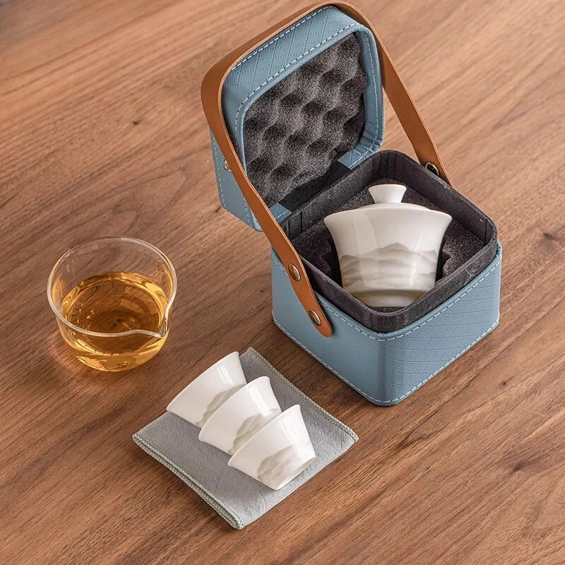 Набор для чаепития из нефрита «Овечий жир» с пейзажным узором, креативный, 1 чайник, 3 чашки, для кемпинга, портативный, в сумке, для активного отдыха, набор для чаепития, ручная работа
Набор для чаепития из нефрита «Овечий жир» с пейзажным узором, креативный, 1 чайник, 3 чашки, для кемпинга, портативный, в сумке, для активного отдыха, набор для чаепития, ручная работа