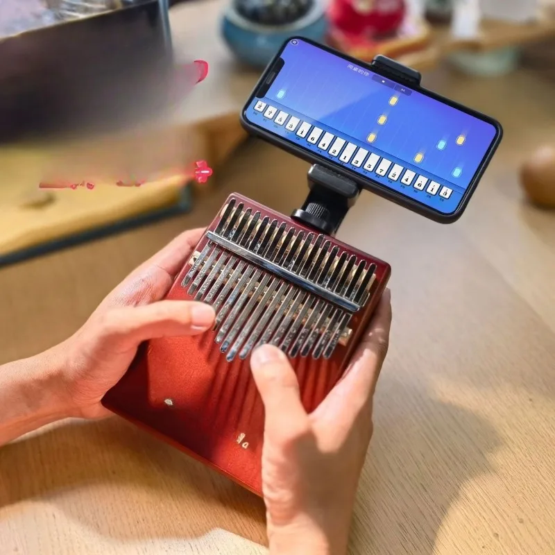 Finger piano girl beginner small 17-tone 21-tone easy-to-learn musical instrument gift thumb piano
Finger piano girl beginner small 17-tone 21-tone easy-to-learn musical instrument gift thumb piano