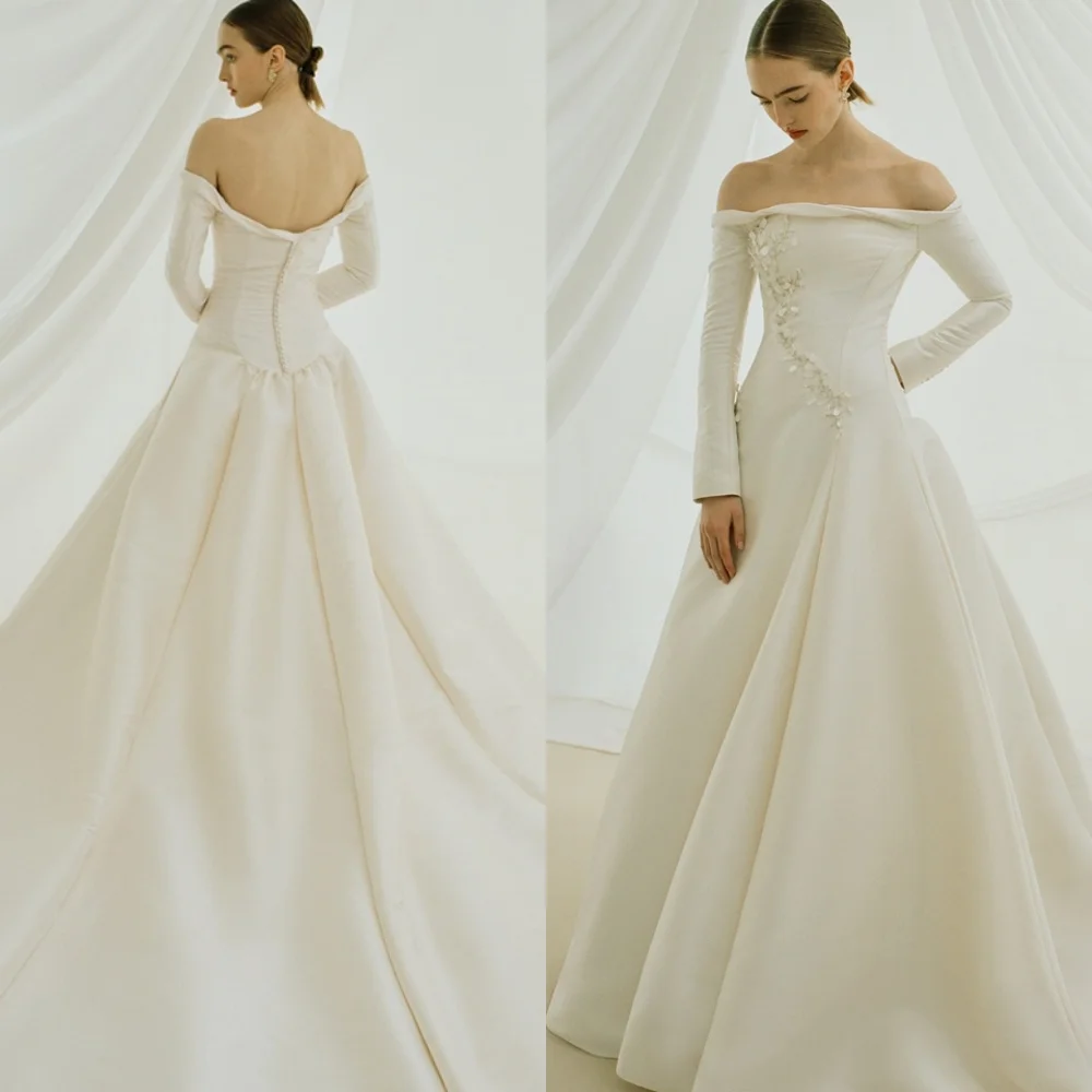 Customized Fashion Ivory Wedding Dresses Dreamy Off the Shoulder Long Sleeves Heavy Industry Wedding Dresses 2025 Bride Gowns
Customized Fashion Ivory Wedding Dresses Dreamy Off the Shoulder Long Sleeves Heavy Industry Wedding Dresses 2025 Bride Gowns