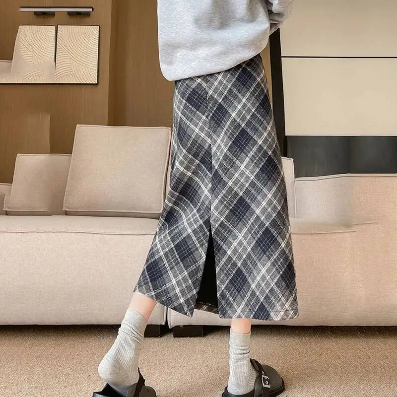 Винтажные шерстяные клетчатые юбки для женщин, осень-зима, длинная женская корейская уличная одежда с высокой талией и разрезом, контрастная юбка трапециевидной формы
Винтажные шерстяные клетчатые юбки для женщин, осень-зима, длинная женская корейская уличная одежда с высокой талией и разрезом, контрастная юбка трапециевидной формы
