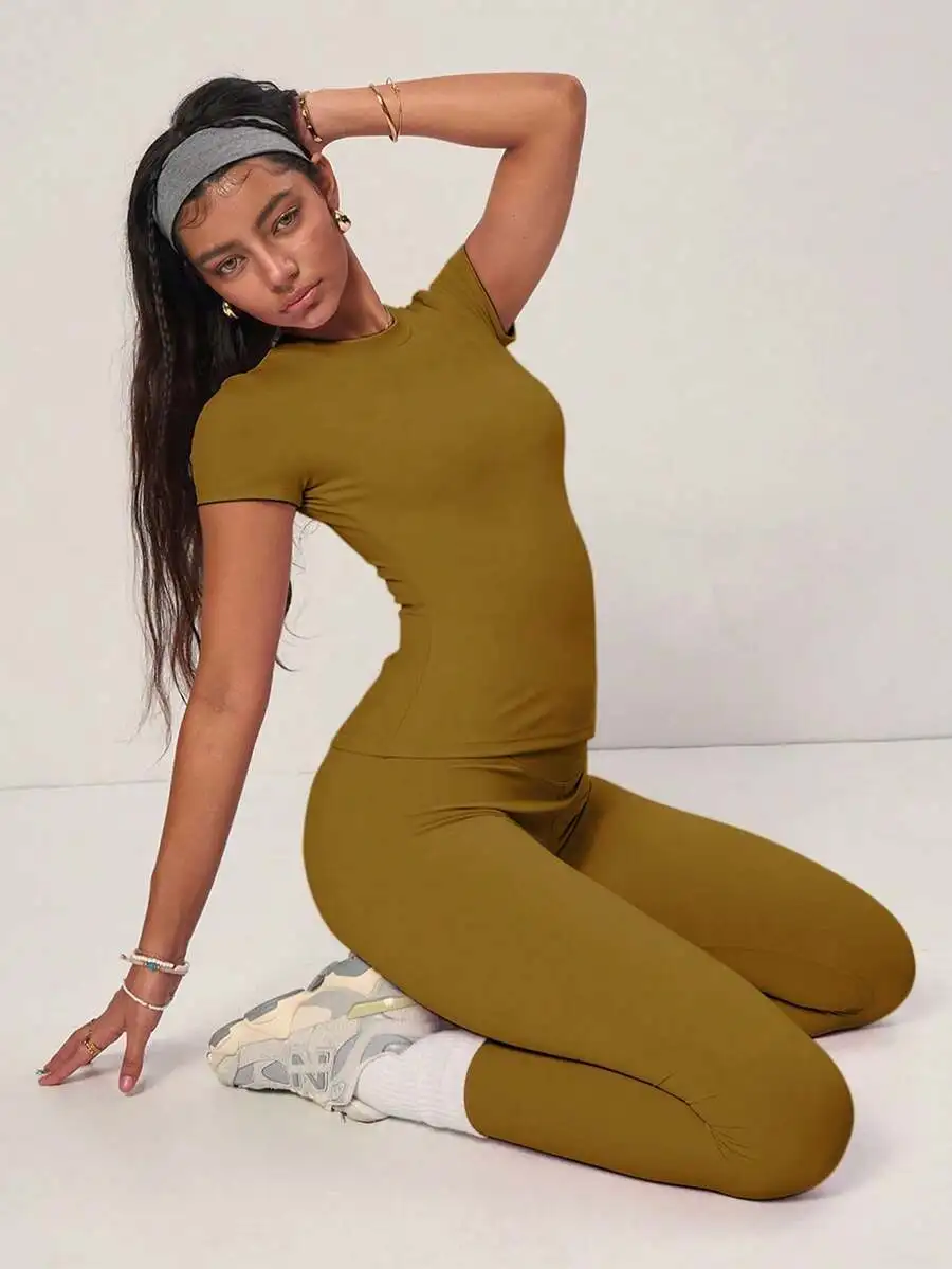 Olive Green Basic Short Sleeve Top And High Waisted Slim Fit Pants Set For Casual Workout
Olive Green Basic Short Sleeve Top And High Waisted Slim Fit Pants Set For Casual Workout