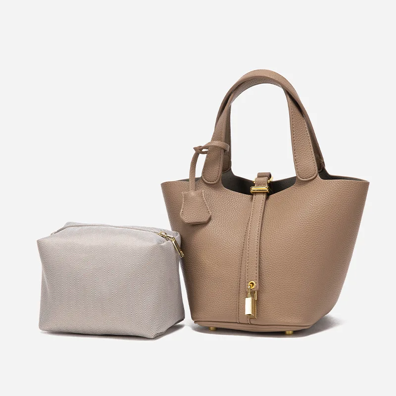Fashionable lychee patterned leather women's vegetable basket, bucket bag, niche handbag, mommy bag, high-end feel
Fashionable lychee patterned leather women's vegetable basket, bucket bag, niche handbag, mommy bag, high-end feel