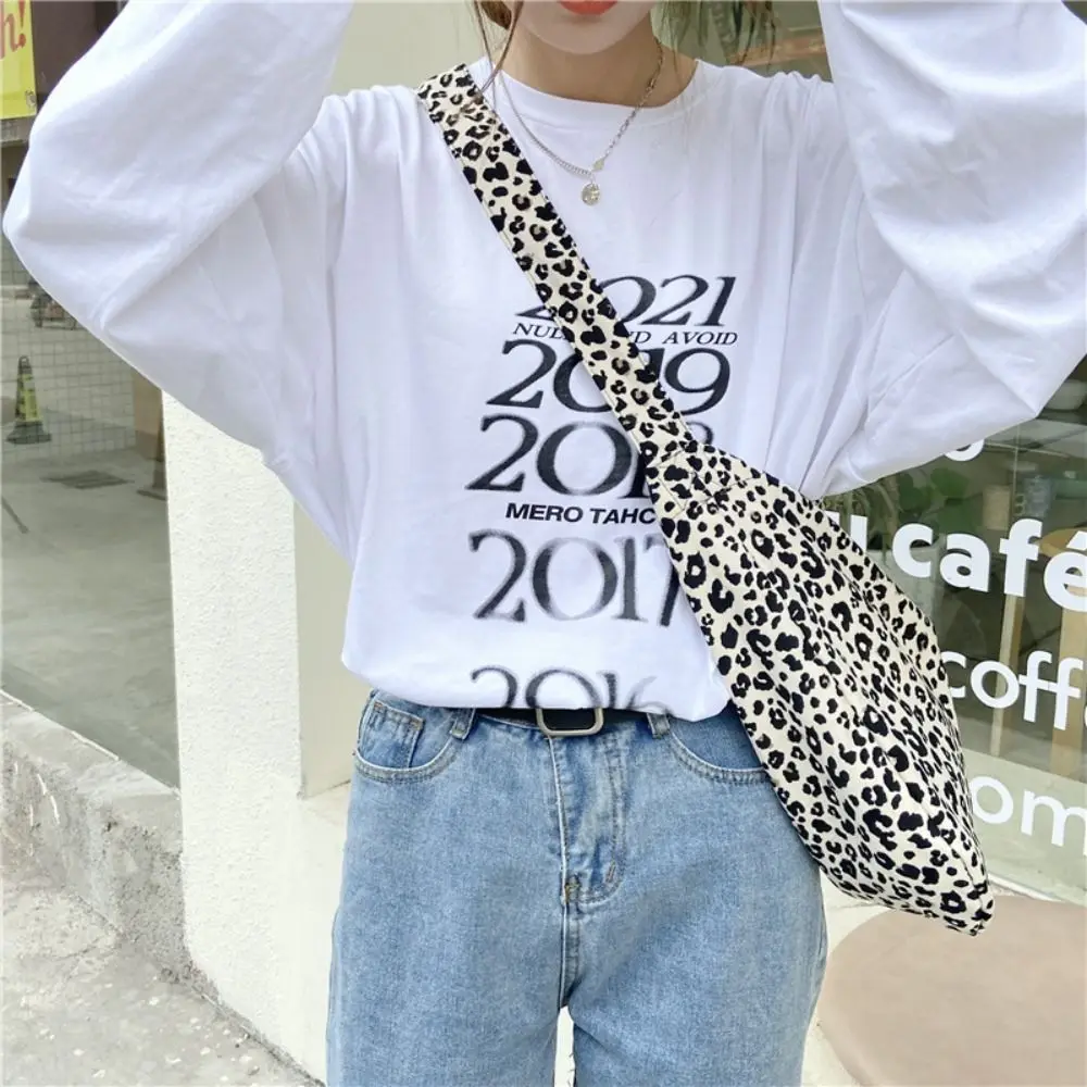 Printed Leopard Print Handbag Korean Style Tote Bag Canvas Crossbody Bag Storage Bag Large Capacity Canvas Shoulder Bag
Printed Leopard Print Handbag Korean Style Tote Bag Canvas Crossbody Bag Storage Bag Large Capacity Canvas Shoulder Bag