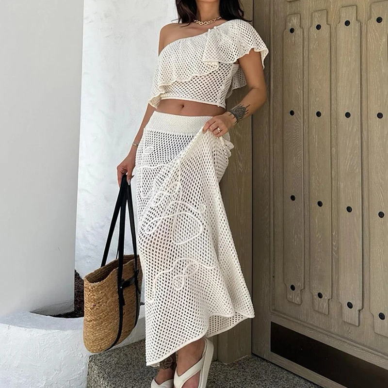 Solid color sexy knitted beach dress casual women's set 2026 spring/summer new top and long skirt cover sun protection set
Solid color sexy knitted beach dress casual women's set 2026 spring/summer new top and long skirt cover sun protection set