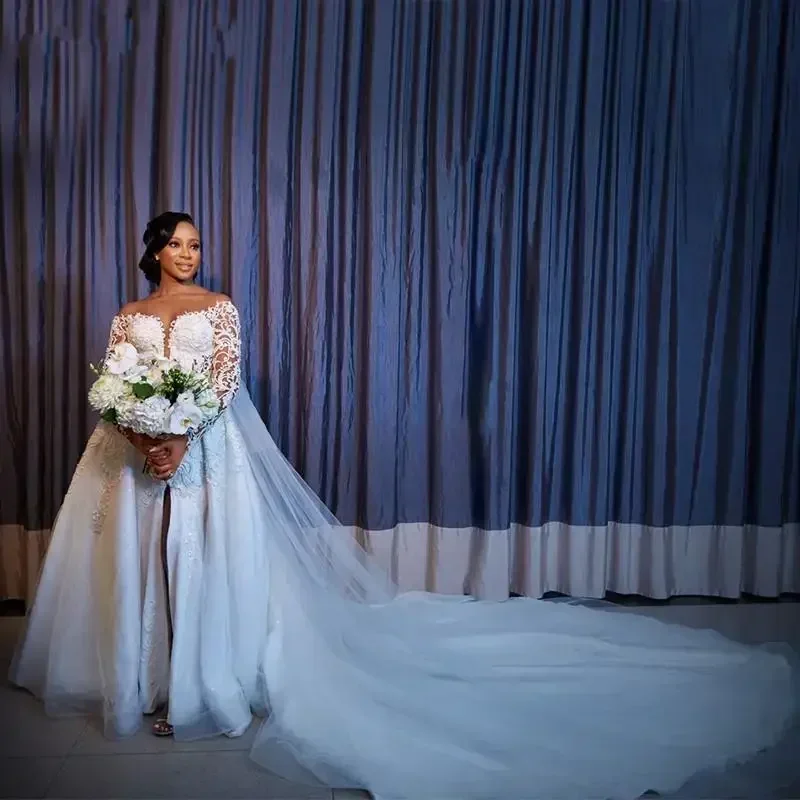 Свадебное платье русалки с жемчугом и бисером по индивидуальному заказу, со съемным шлейфом в виде собора, пляжное свадебное платье с разрезом по бокам
Свадебное платье русалки с жемчугом и бисером по индивидуальному заказу, со съемным шлейфом в виде собора, пляжное свадебное платье с разрезом по бокам