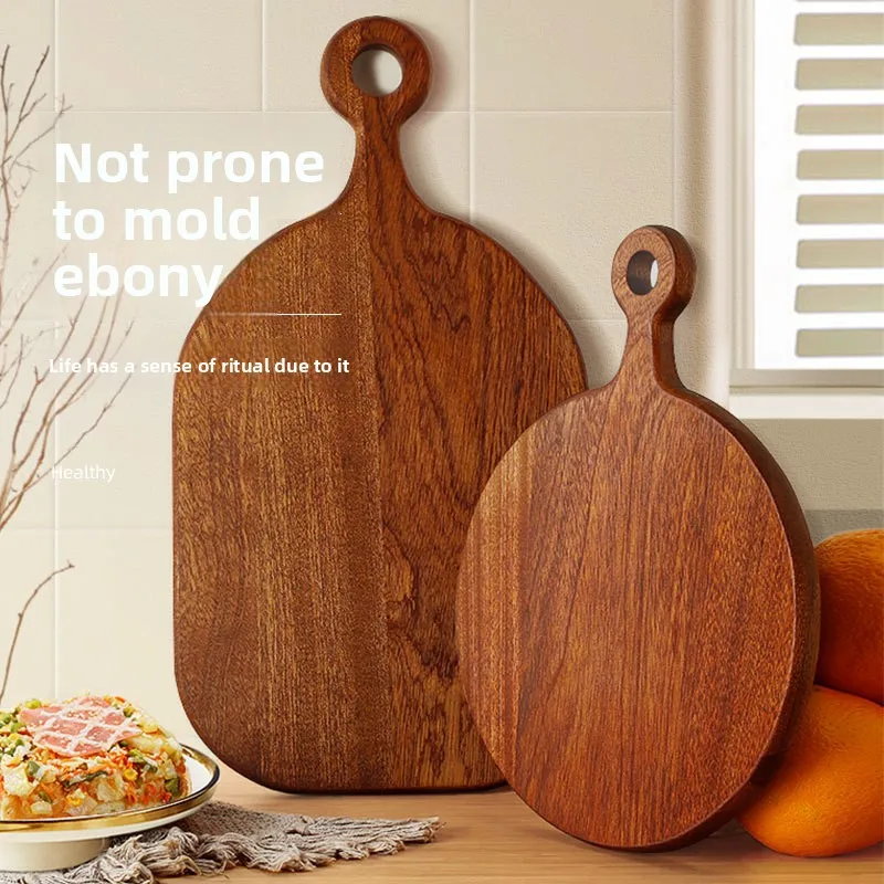 Ebony pizza board Ebony cutting Kitchen household wooden cutting Fruit bread tray Round chopping
Ebony pizza board Ebony cutting Kitchen household wooden cutting Fruit bread tray Round chopping