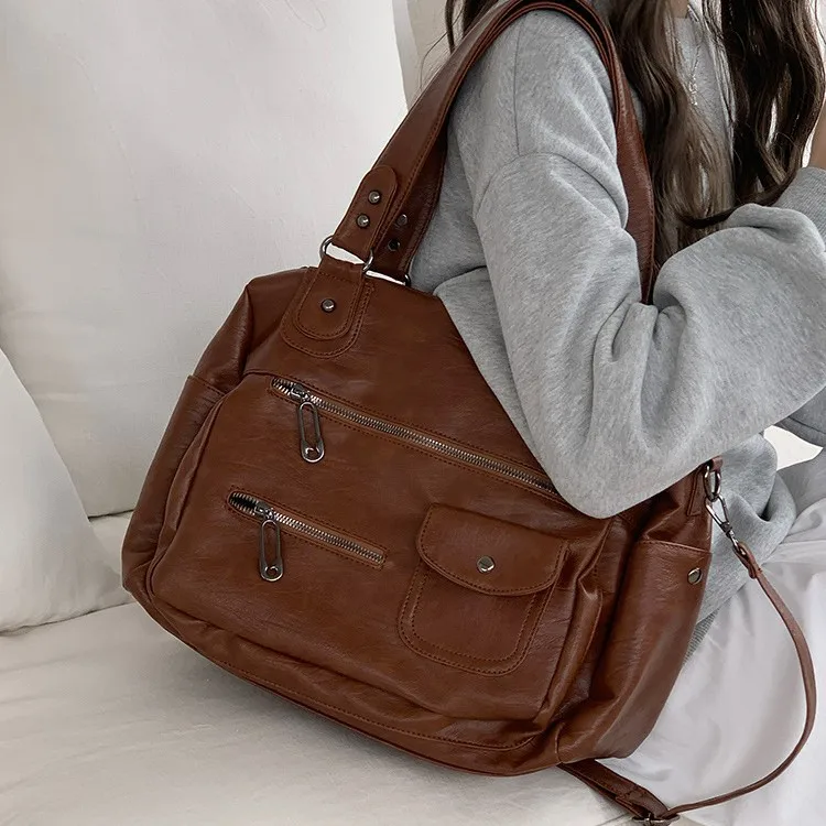 Ретро однотонная модная тенденция, большие сумки, индивидуальная молния, украшение на плечо, сумка через плечо, большая вместительная дорожная сумка
Ретро однотонная модная тенденция, большие сумки, индивидуальная молния, украшение на плечо, сумка через плечо, большая вместительная дорожная сумка