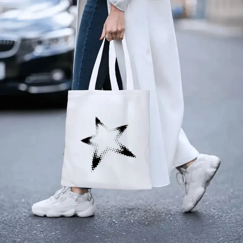 Black Dot Star Print White Canvas Tote Bag, Women Shoulder Bag, Minimalist Y2K Handbag for Trendy Outfits
Black Dot Star Print White Canvas Tote Bag, Women Shoulder Bag, Minimalist Y2K Handbag for Trendy Outfits