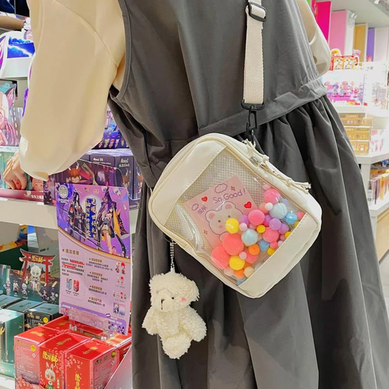 HAEX Harajuku Mini Ita Bags Women JK Uniform Girls Badge Bag Female Y2K Transparent Hairball Doll Show Crossbody Shoulder Bolso
HAEX Harajuku Mini Ita Bags Women JK Uniform Girls Badge Bag Female Y2K Transparent Hairball Doll Show Crossbody Shoulder Bolso