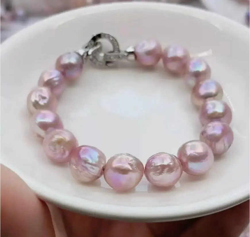 elegant 9-11mm south sea pink purple baroque pearl bracelet7.5-8"
elegant 9-11mm south sea pink purple baroque pearl bracelet7.5-8"