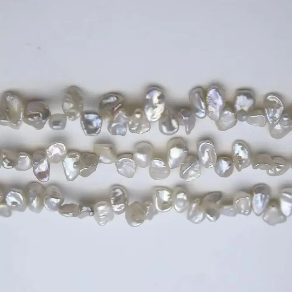 12-13mm Natural Freshwater Pearl Beaded White Irregular Shape Length 38cm for Jewelry Making DIY Necklace Bracelet Accessories
12-13mm Natural Freshwater Pearl Beaded White Irregular Shape Length 38cm for Jewelry Making DIY Necklace Bracelet Accessories