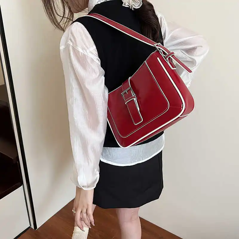 New Red College Style Belt Buckle Underarm Bag PU Leather Splicing Color Commuter Bag Fashion Versatile Handheld Shoulder Bag
New Red College Style Belt Buckle Underarm Bag PU Leather Splicing Color Commuter Bag Fashion Versatile Handheld Shoulder Bag