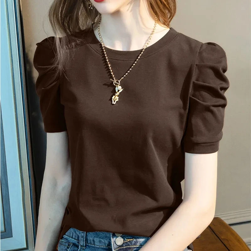 2024 Summer New Female Cotton Round Neck Short Sleeved T-shirt Women French Bubble Sleeve Round Neck Solid Color T-shirt Blouse
2024 Summer New Female Cotton Round Neck Short Sleeved T-shirt Women French Bubble Sleeve Round Neck Solid Color T-shirt Blouse