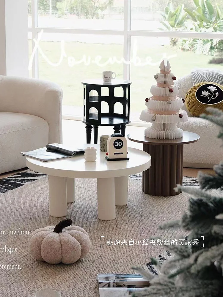 French Internet celebrity personality creative solid wood round coffee table cream Nordic living room small apartment
French Internet celebrity personality creative solid wood round coffee table cream Nordic living room small apartment