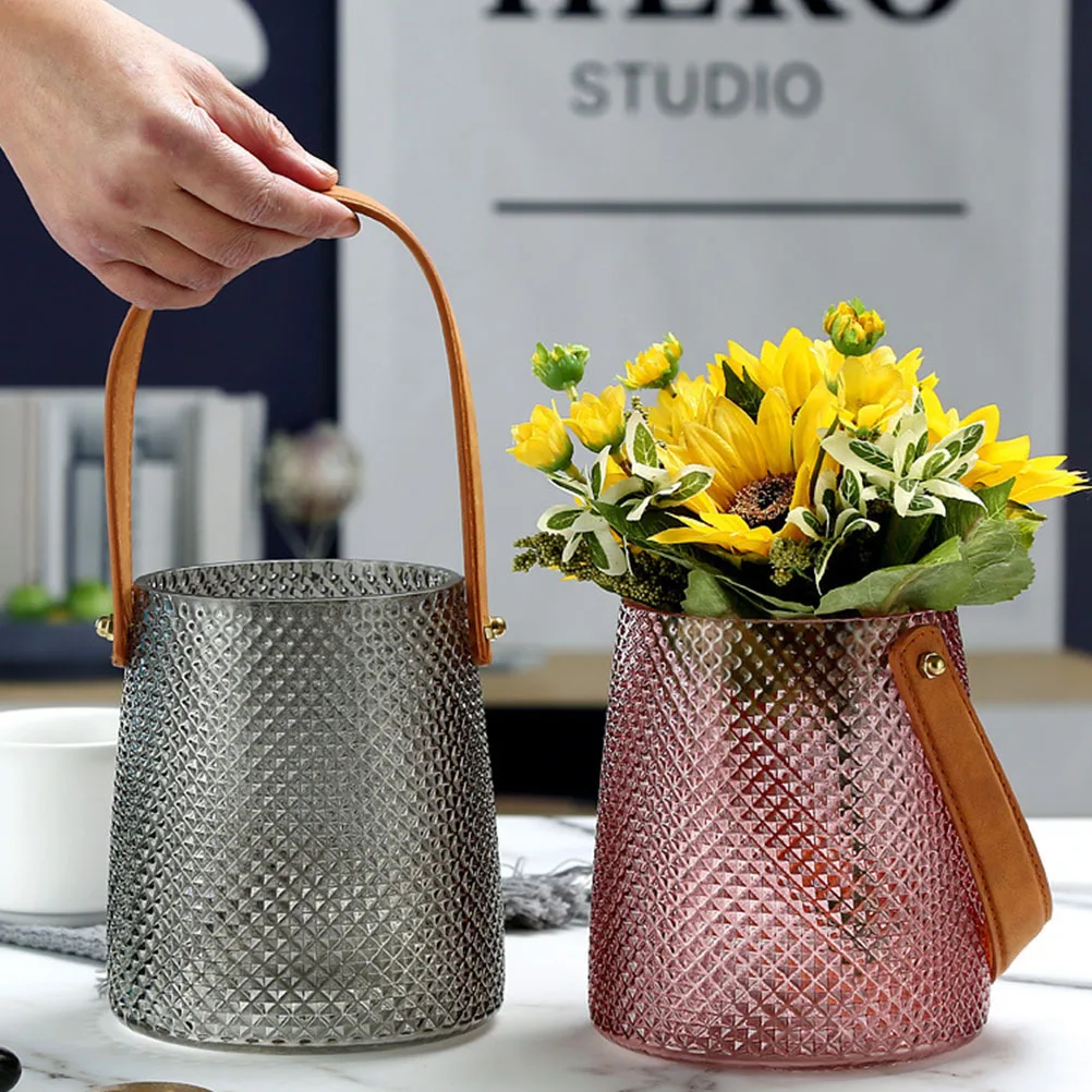 1Pcs Hand-Held Glass Flower Vase Retro Design Thick Stable Base for Water Plant Growth Home Office Wedding Decorative Creative
1Pcs Hand-Held Glass Flower Vase Retro Design Thick Stable Base for Water Plant Growth Home Office Wedding Decorative Creative