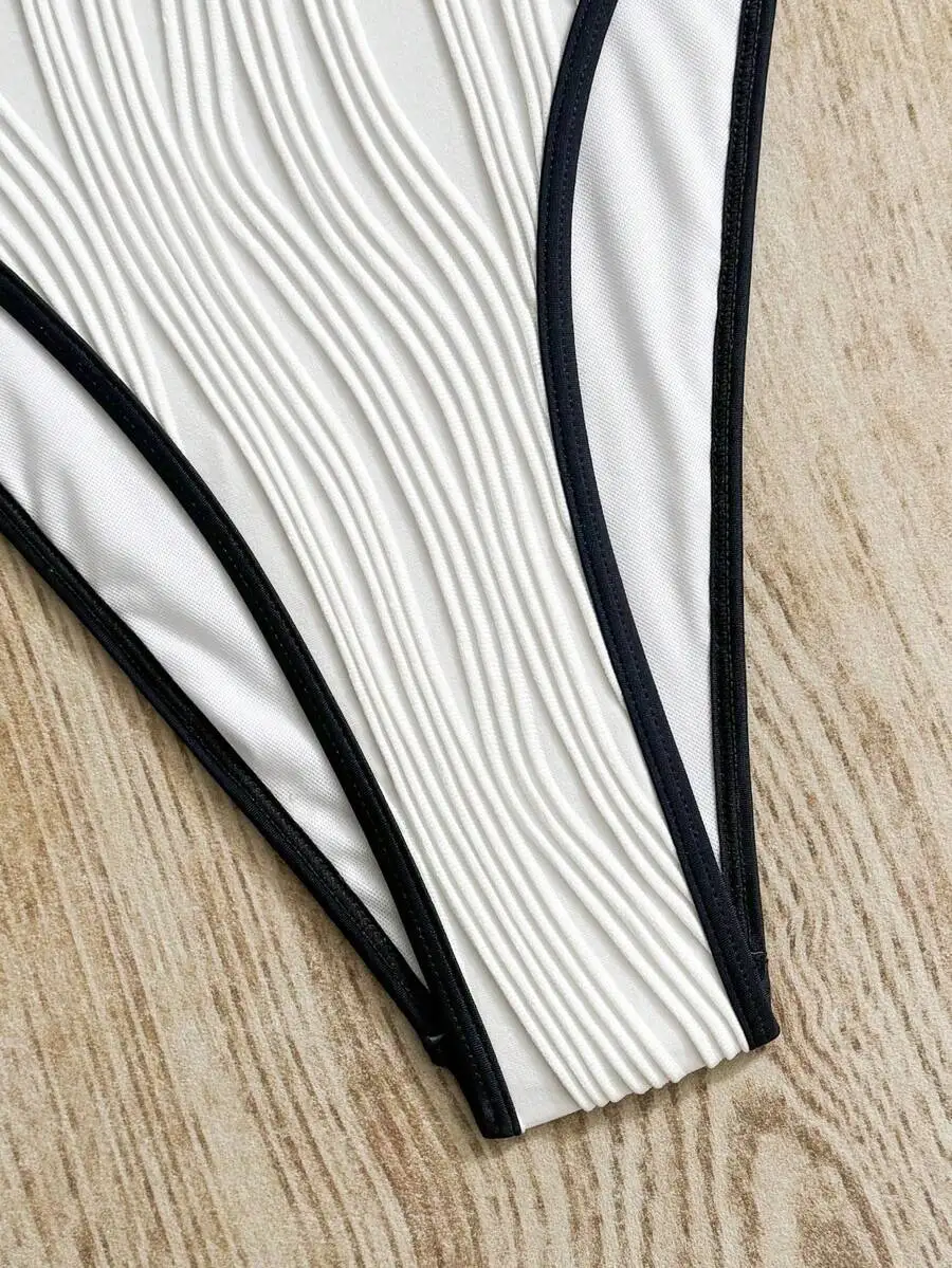 White Black Contrast Color Deep V One Piece Swimsuit Women Textured Fabric Hollow Out Backless Beach Party Swimwear
White Black Contrast Color Deep V One Piece Swimsuit Women Textured Fabric Hollow Out Backless Beach Party Swimwear