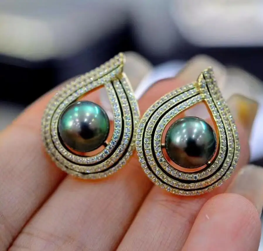gorgeous 9-10mm south sea black round pearl earring 925s
gorgeous 9-10mm south sea black round pearl earring 925s