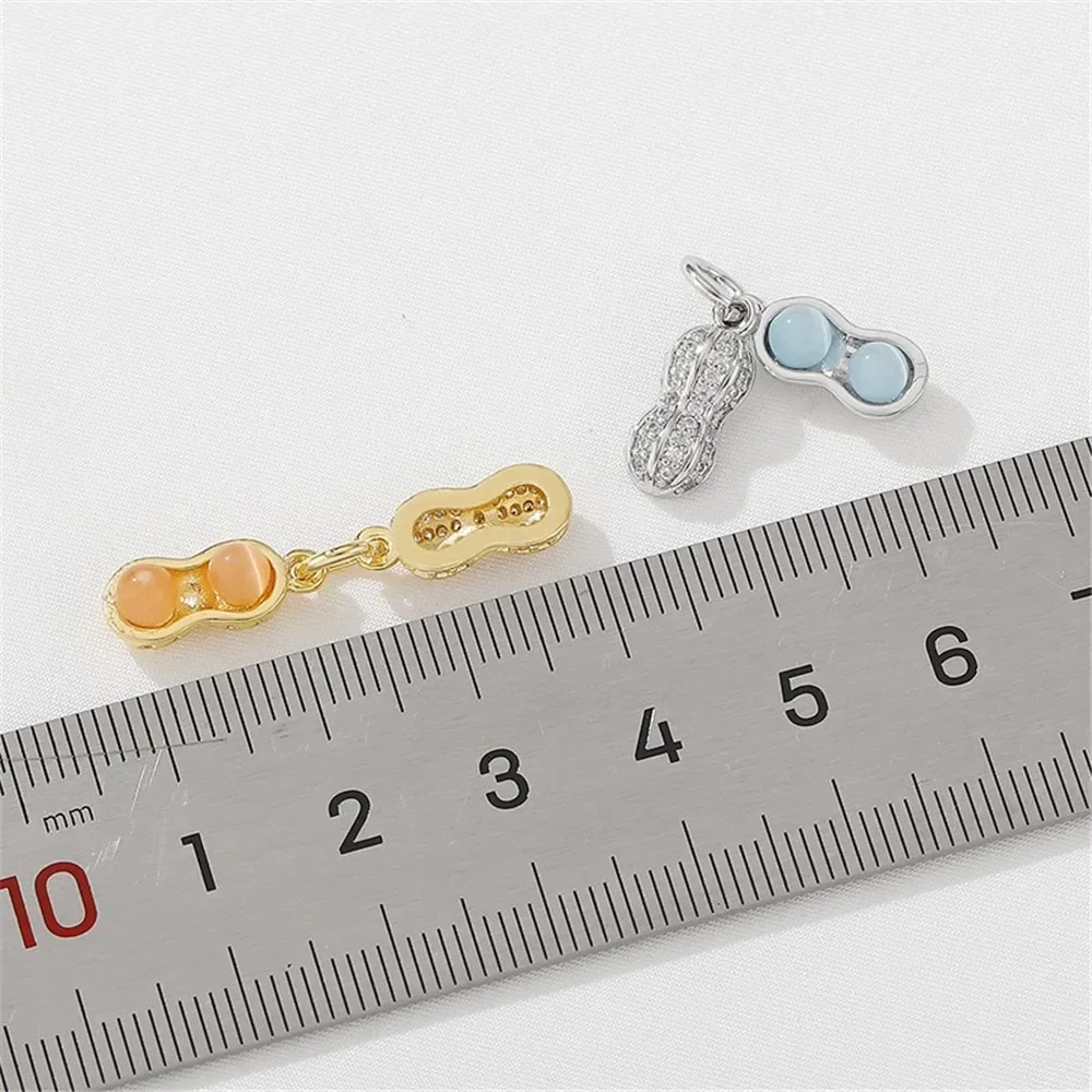 18K Gold Inlaid Zircon Cat's Eye Stone Auspicious Peanut Pendant DIY Bracelet Necklace Jewelry Material Accessories L473
18K Gold Inlaid Zircon Cat's Eye Stone Auspicious Peanut Pendant DIY Bracelet Necklace Jewelry Material Accessories L473