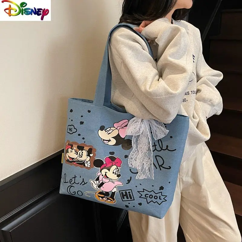 Disney fashion high-quality denim cartoon Mickey handbag women's casual versatile large capacity storage tote bag
Disney fashion high-quality denim cartoon Mickey handbag women's casual versatile large capacity storage tote bag