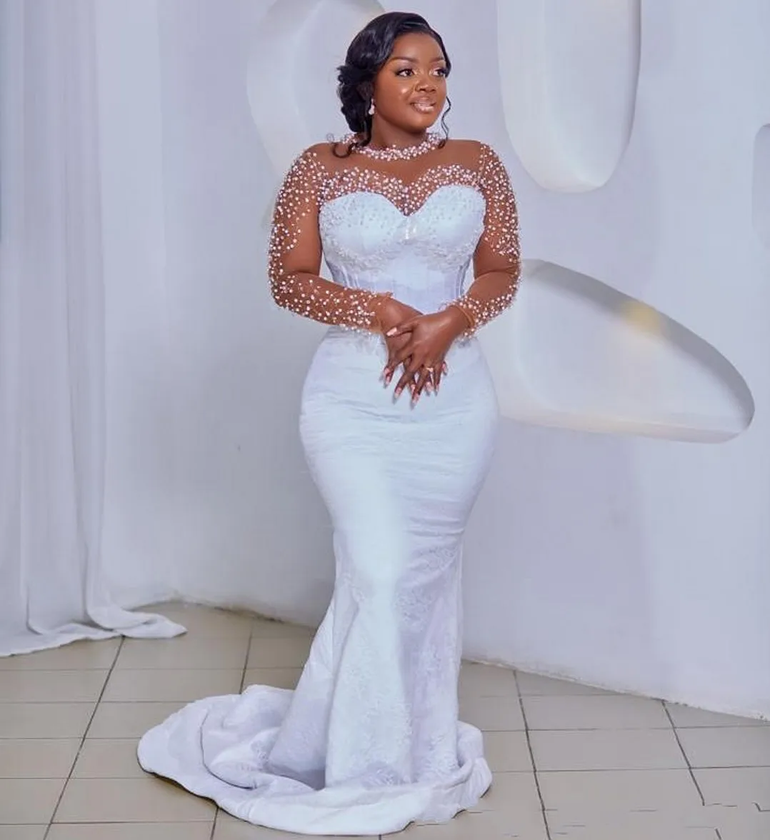 Sexy Mermaid Wedding Dress 2026 Sheer Neck Long Sleeves Beaded Lace Pearls Bride Gowns New African Vestidos De Noiva
Sexy Mermaid Wedding Dress 2026 Sheer Neck Long Sleeves Beaded Lace Pearls Bride Gowns New African Vestidos De Noiva