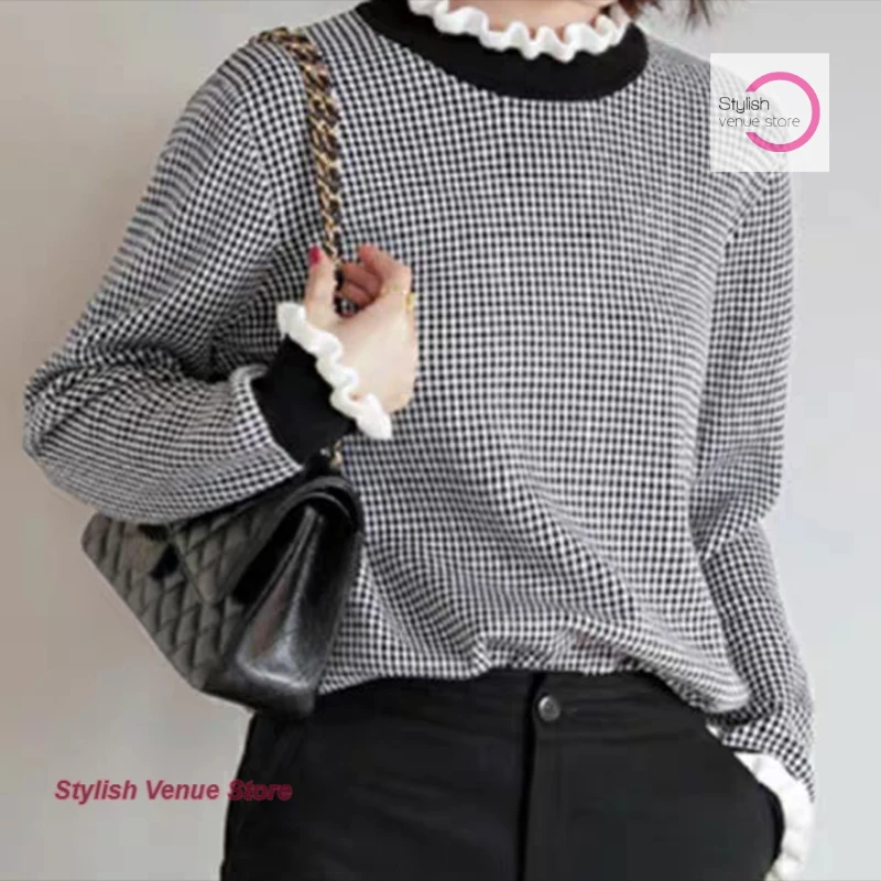 Korean style casual lazy wind loose Joker houndstooth plaid sweater women's autumn and winter clothes wooden ear pullover coat.
Korean style casual lazy wind loose Joker houndstooth plaid sweater women's autumn and winter clothes wooden ear pullover coat.