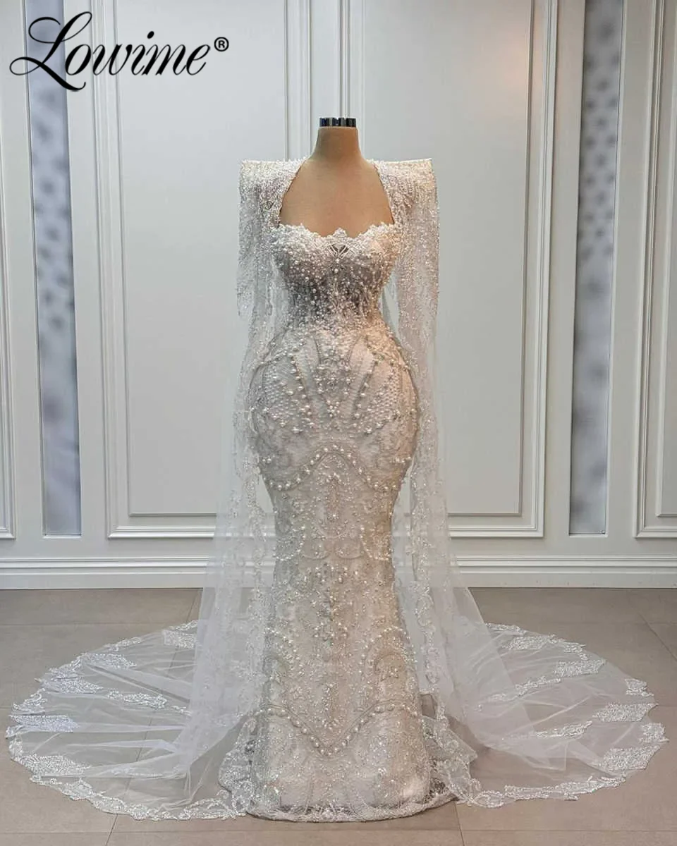 Великолепные свадебные платья цвета слоновой кости с жемчужным кружевом и накидкой на рукавах, платье русалки для выпускного вечера, арабские вечерние платья по индивидуальному заказу, халаты из двух частей
Великолепные свадебные платья цвета слоновой кости с жемчужным кружевом и накидкой на рукавах, платье русалки для выпускного вечера, арабские вечерние платья по индивидуальному заказу, халаты из двух частей