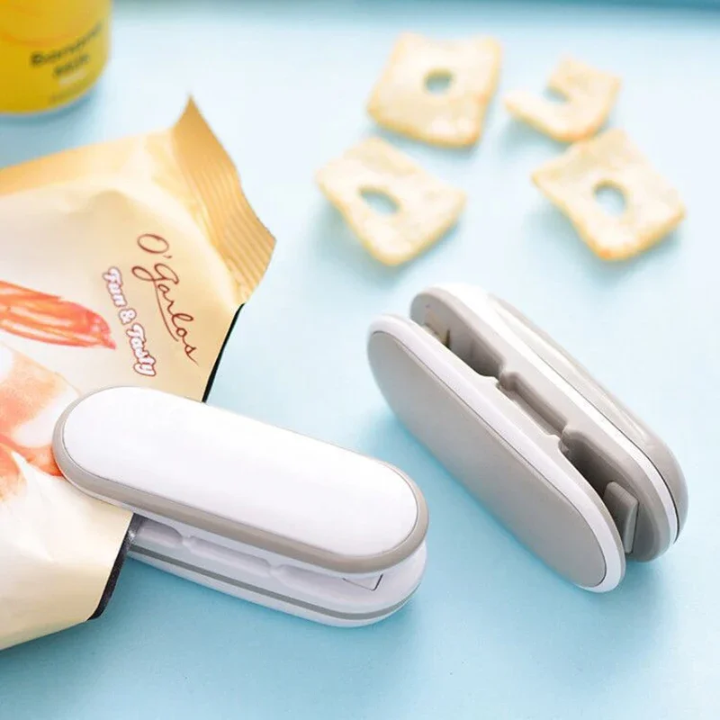 Mini Portable Sealing Machine Hand Pressure Sealing Clip Food Fruit Preservation Sealing Clip Household Heat Sealing Machine
Mini Portable Sealing Machine Hand Pressure Sealing Clip Food Fruit Preservation Sealing Clip Household Heat Sealing Machine