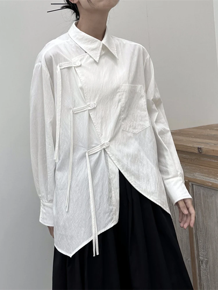 White Buckle Irregular Loose Shirt Blouse Women Lapel Long Sleeve Fashion Shirts Tops Lady Casual Streetwear Outfit Autumn 2025 
White Buckle Irregular Loose Shirt Blouse Women Lapel Long Sleeve Fashion Shirts Tops Lady Casual Streetwear Outfit Autumn 2025