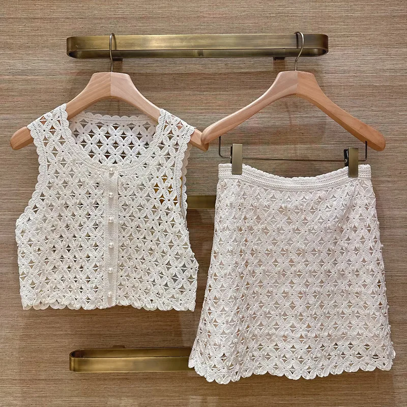 Withered 2026 Summer Crochet Hollow Pearl Sleeveless Round Neck Top Half Skirt Skirt Woman Clothing Faldas Skirts
Withered 2026 Summer Crochet Hollow Pearl Sleeveless Round Neck Top Half Skirt Skirt Woman Clothing Faldas Skirts