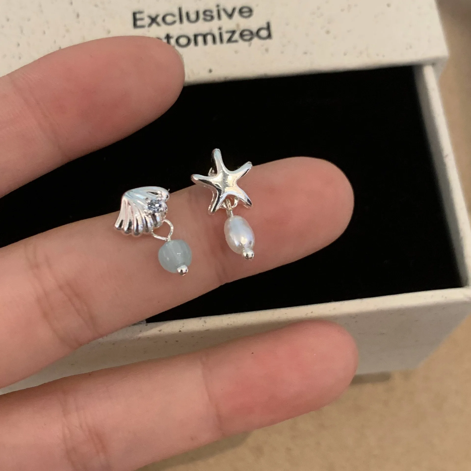 Starfish shell asymmetrical stud earrings women's niche cold feeling Korean versatile earrings light luxury personalized design earrings
Starfish shell asymmetrical stud earrings women's niche cold feeling Korean versatile earrings light luxury personalized design earrings