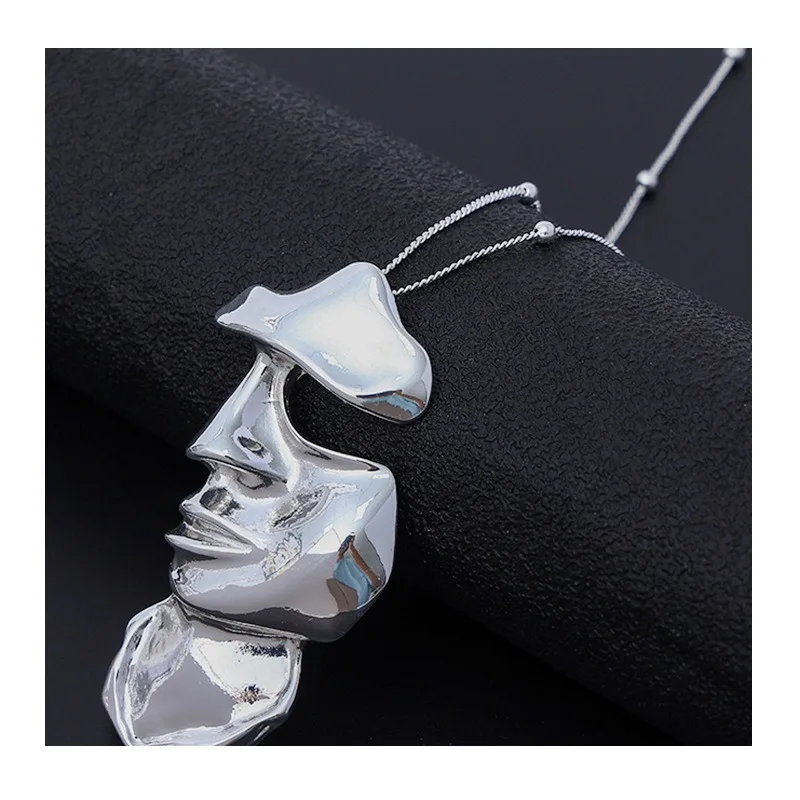 New Necklace Simple Pendant Cold Wind Abstract Face Alloy Sweater Chain Pendant
New Necklace Simple Pendant Cold Wind Abstract Face Alloy Sweater Chain Pendant