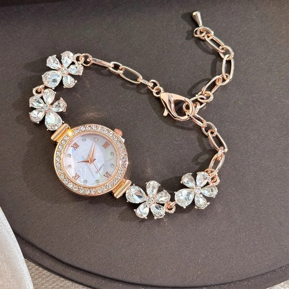 Кварцевые часы-браслет с римскими циферблатами, встроенные бриллиантами, драгоценные камни, цветочная застежка, винтажные круглые женские часы, регулируемый корпус из сплава
Кварцевые часы-браслет с римскими циферблатами, встроенные бриллиантами, драгоценные камни, цветочная застежка, винтажные круглые женские часы, регулируемый корпус из сплава