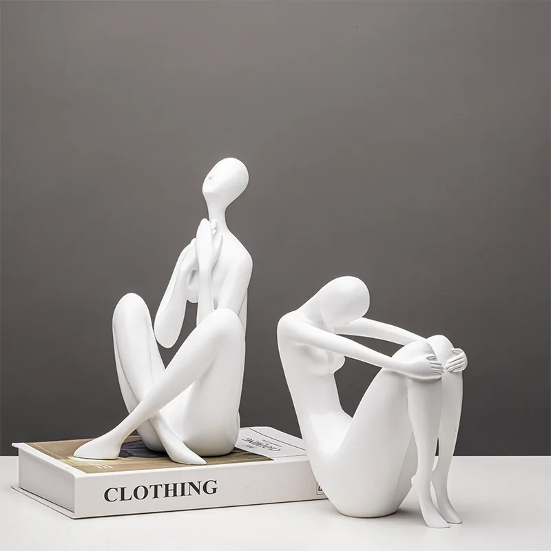 Minimalist modern sculpture of a figure holding their head and knees, paired with Italian minimalist Nordic gymnastics home
Minimalist modern sculpture of a figure holding their head and knees, paired with Italian minimalist Nordic gymnastics home