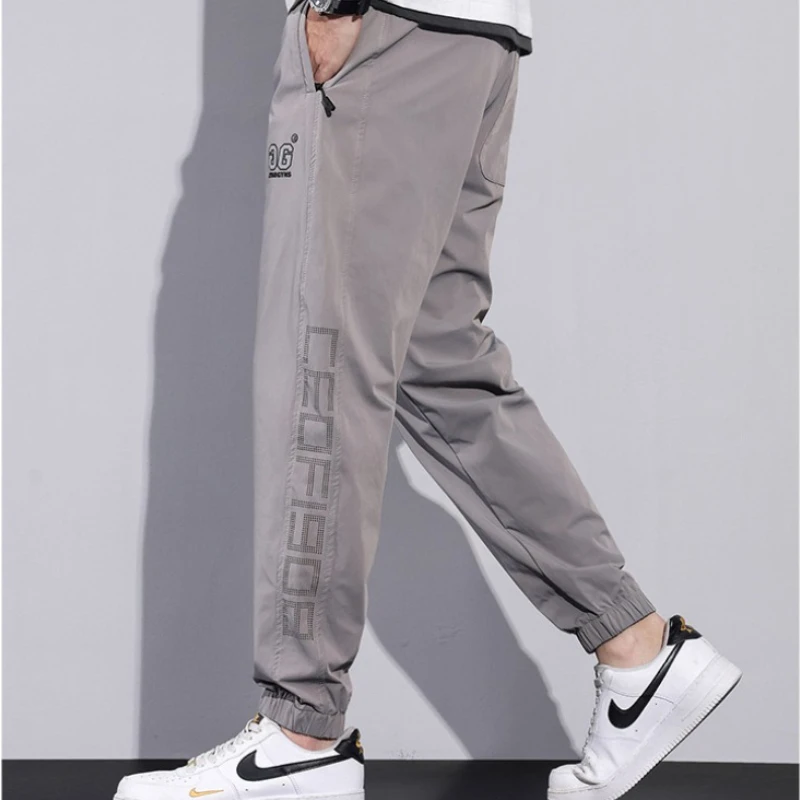 Casual Pants Men's Summer Thin Letter Printed Mid-waist Harlan Pants New Arrived Loose Ankle-length Drawstring Sports Pants Male
Casual Pants Men's Summer Thin Letter Printed Mid-waist Harlan Pants New Arrived Loose Ankle-length Drawstring Sports Pants Male