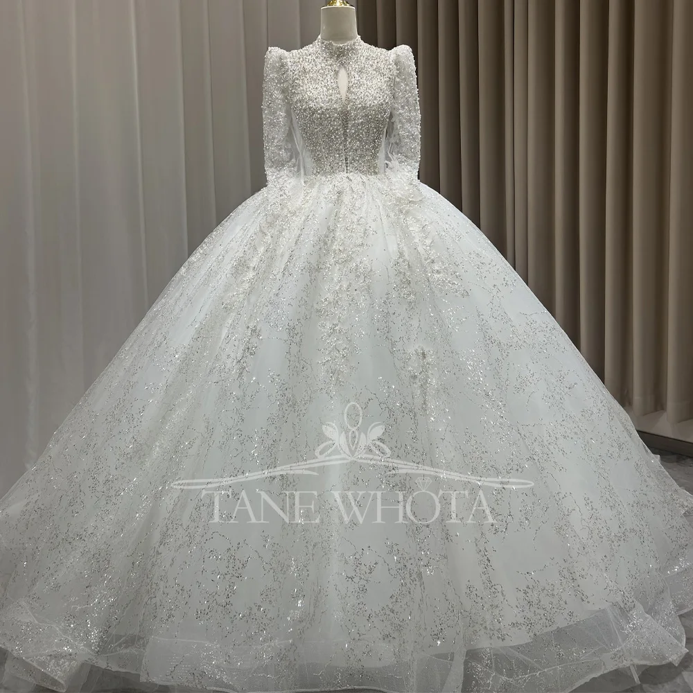 Vestidos De Novias Гражданское роскошное свадебное платье с высоким рукавом на шнуровке и замочной скважиной сзади, блестками, вышивкой бисером, индивидуальное роскошное свадебное платье
Vestidos De Novias Гражданское роскошное свадебное платье с высоким рукавом на шнуровке и замочной скважиной сзади, блестками, вышивкой бисером, индивидуальное роскошное свадебное платье