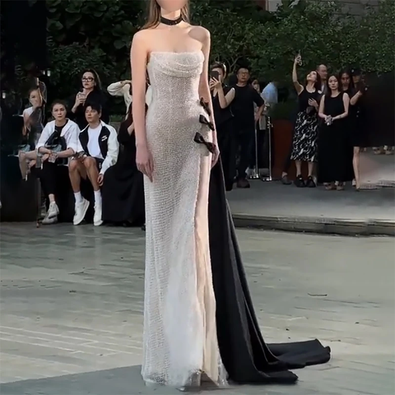 Customized New In Silver Sequin Mermaid Evening Dresses Strapless Sleeveless Black bow tie Shinny Women Celebrity Dresses 2026
Customized New In Silver Sequin Mermaid Evening Dresses Strapless Sleeveless Black bow tie Shinny Women Celebrity Dresses 2026