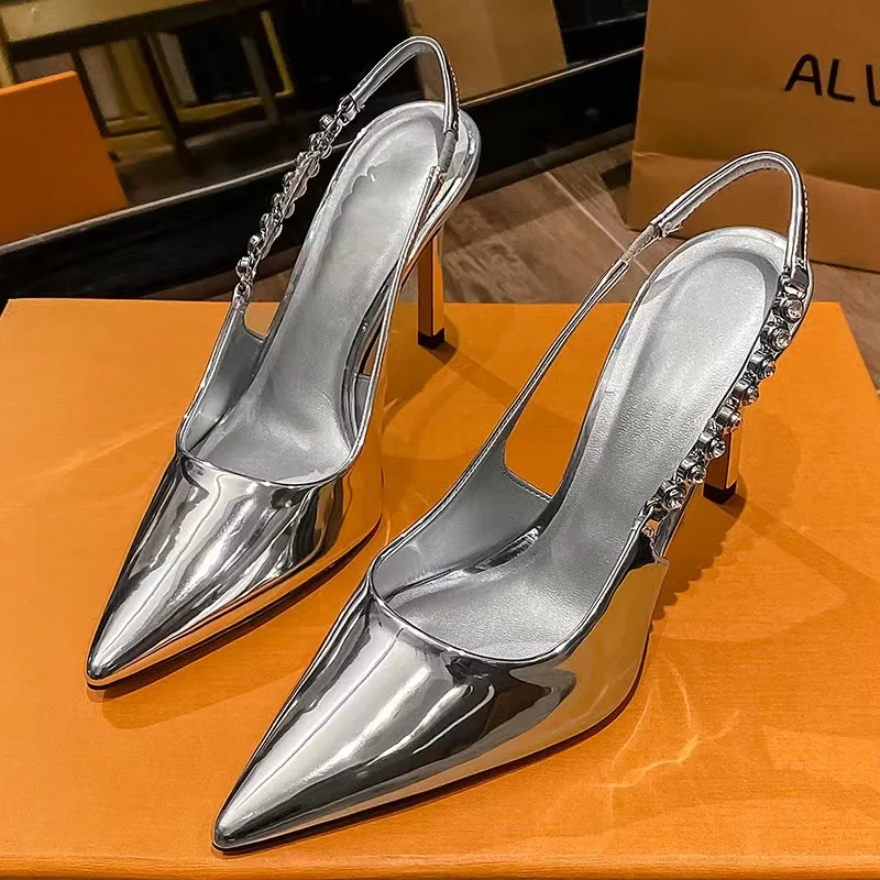 Sexy pointedtoe high heels 2026 summer silver fashionable patent leather rhinestone women's shoes opentoe Stiletto heels sandals
Sexy pointedtoe high heels 2026 summer silver fashionable patent leather rhinestone women's shoes opentoe Stiletto heels sandals