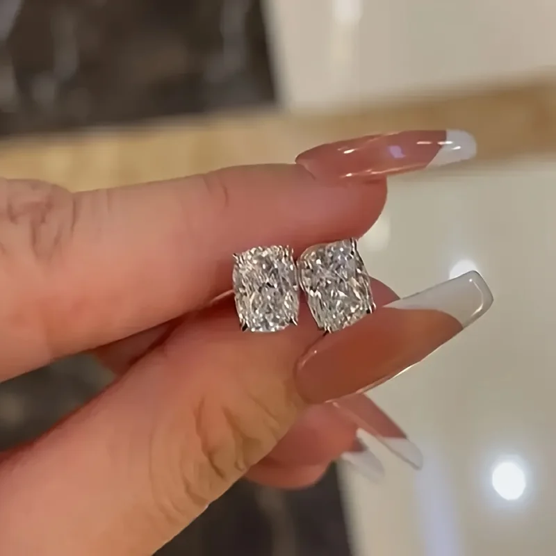 A set of shiny square zirconia earrings made of S925 sterling silver, women's style. These simple and elegant earrings are perfe
A set of shiny square zirconia earrings made of S925 sterling silver, women's style. These simple and elegant earrings are perfe