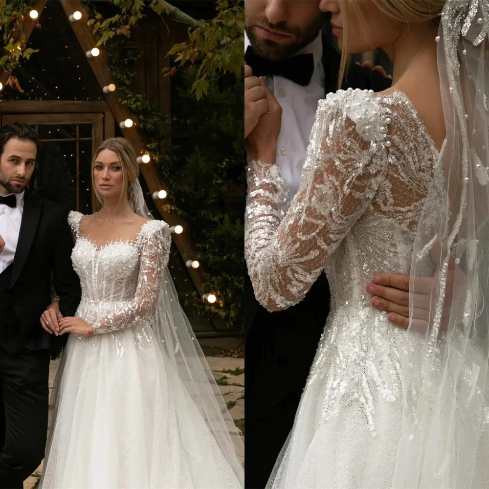 Luxury Sheer Round Wedding Dresses Exquisite Sequin Appliques Long Sleeves Sweep Train Lace Up Back Bridal Gown vestido de novia
Luxury Sheer Round Wedding Dresses Exquisite Sequin Appliques Long Sleeves Sweep Train Lace Up Back Bridal Gown vestido de novia