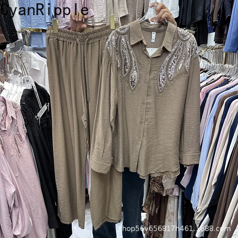 Fashion Women Two-piece Sets Embroidery Sequins Beads Loose Long Sleeve Shirt Top + Elastic Waist Casual Wide Leg Straight Pants
Fashion Women Two-piece Sets Embroidery Sequins Beads Loose Long Sleeve Shirt Top + Elastic Waist Casual Wide Leg Straight Pants