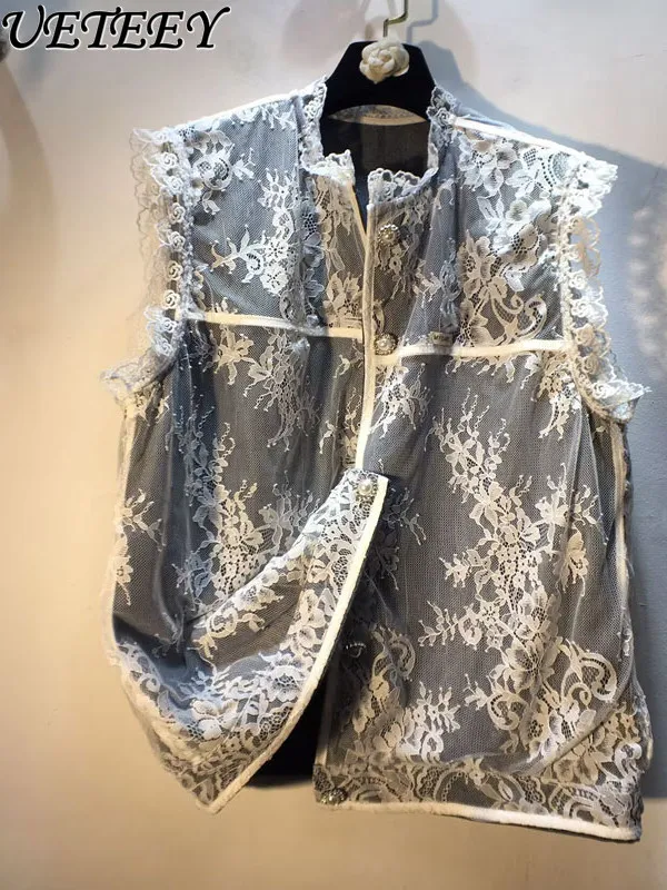 Spring and Summer New Splicing Embroidered Mesh Lace Sleeveless Tank Top Loose and Thin Versatile Denim Vest Jacket for Women
Spring and Summer New Splicing Embroidered Mesh Lace Sleeveless Tank Top Loose and Thin Versatile Denim Vest Jacket for Women