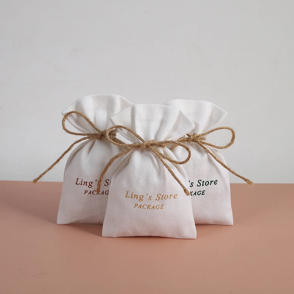 50Pcs Can Custom Logo White Cotton Jewelry Canvas Pouches Wedding Gift Earring Necklace 7x9cm 8x10cm Lovely Packaging Container
50Pcs Can Custom Logo White Cotton Jewelry Canvas Pouches Wedding Gift Earring Necklace 7x9cm 8x10cm Lovely Packaging Container