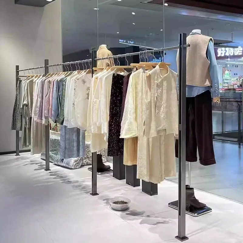 Display rack Floor-to-ceiling hanger Men's and women's clothing store Stainless steel wall display rack
Display rack Floor-to-ceiling hanger Men's and women's clothing store Stainless steel wall display rack