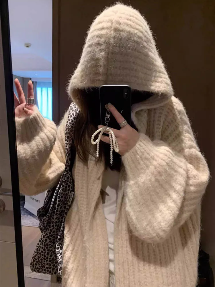 Ленивый мягкий восковой свитер с капюшоном, женская осенне-зимняя корейская свободная вязаная верхняя куртка средней длины, толстое 10
Ленивый мягкий восковой свитер с капюшоном, женская осенне-зимняя корейская свободная вязаная верхняя куртка средней длины, толстое 10