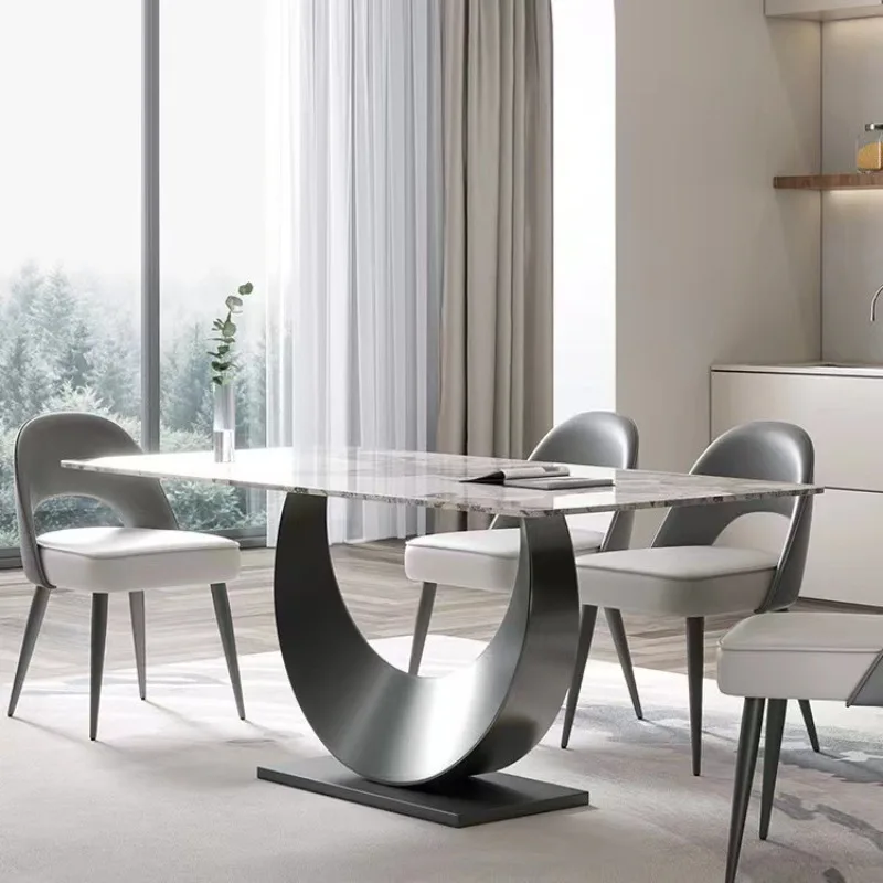 Italian minimalist stainless steel dining table rectangular household small apartment dining table chair combination
Italian minimalist stainless steel dining table rectangular household small apartment dining table chair combination
