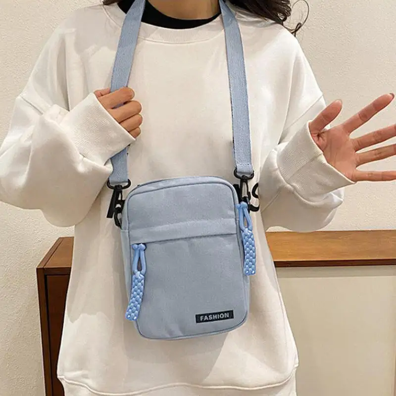 Женская сумка, маленькая квадратная сумка, диагональная кроссоверная ткань Оксфорд, мужская сумка, модная ручная машина, повседневные сумки, сумки для багажа
Женская сумка, маленькая квадратная сумка, диагональная кроссоверная ткань Оксфорд, мужская сумка, модная ручная машина, повседневные сумки, сумки для багажа