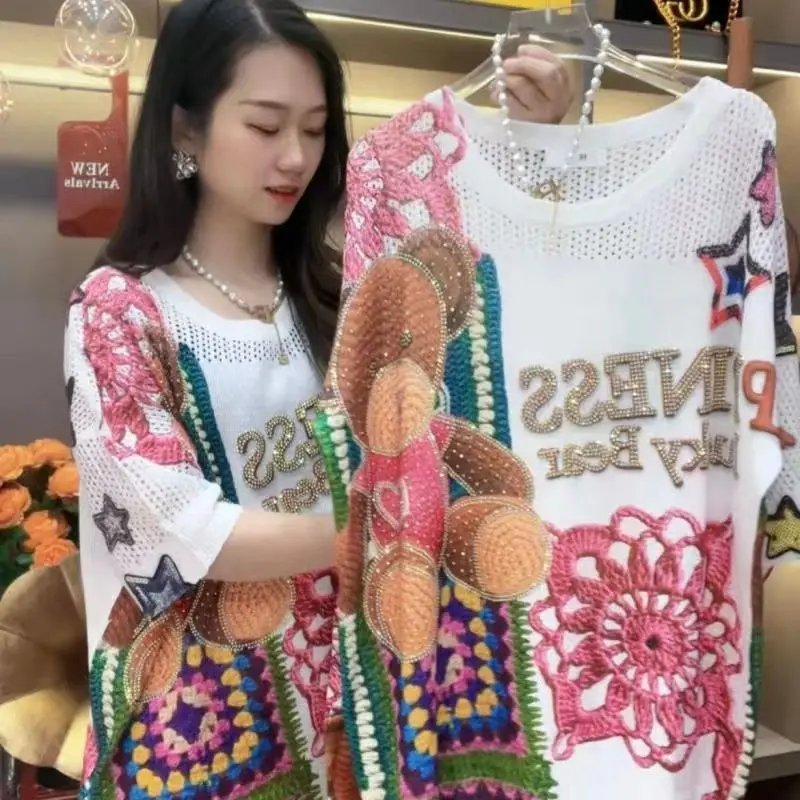 Rose Bear Luxury Printed Rhinestones Round Neck Knitted Sweater Short-sleeved Top Loose Hollow Temperament Pullover
Rose Bear Luxury Printed Rhinestones Round Neck Knitted Sweater Short-sleeved Top Loose Hollow Temperament Pullover